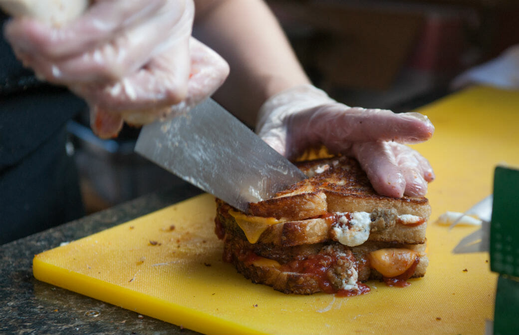 The Taste of Madison features 80 area restaurants serving small portions of awesomeness for $1 – $4. (Photo credit: Focal Flame Photography)