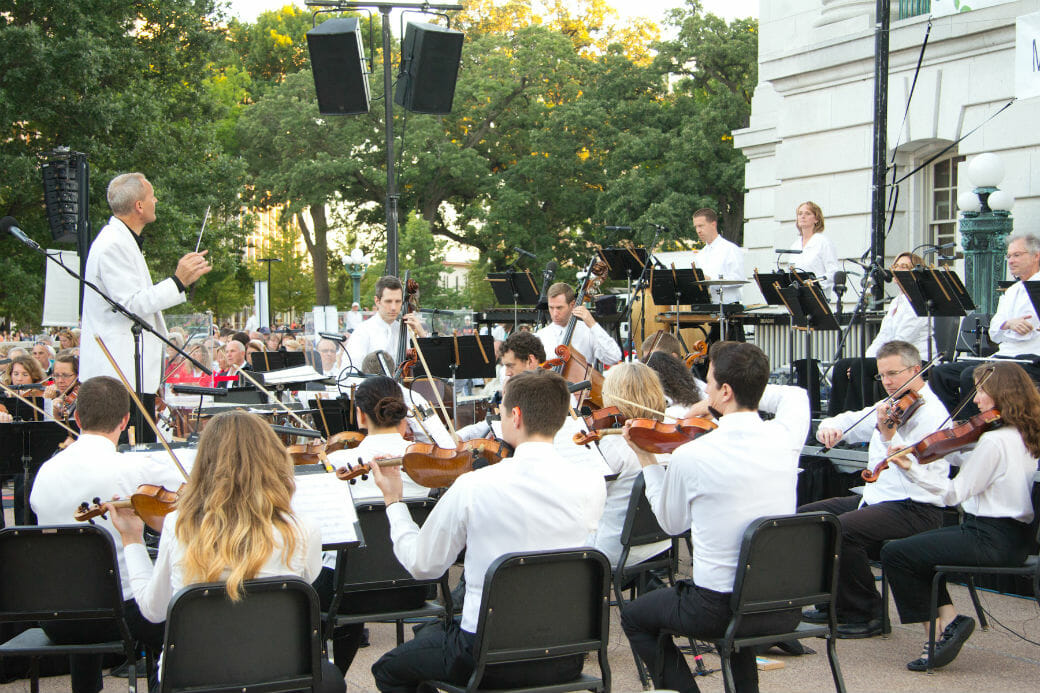 Maestro Andrew Sewell leads the Wisconsin Chamber Orchestra in front of the Capitol Building for the wildly popular summer series, Concerts on the Square. (Photo credit: Wisconsin Chamber Orchestra) - See more at: https://www.theedgewater.com/blog/6-perfect-times-to-come-to-the-madison-wisconsin-capitol-square/#sthash.FRBvmZLA.dpuf