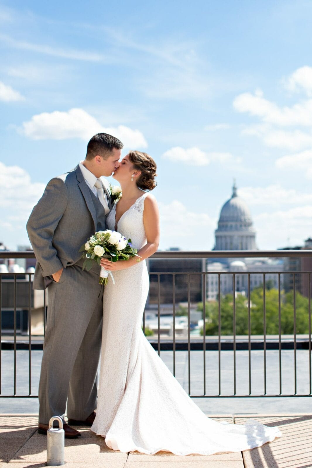 Bride and Groom in front of Capitol Building at The Edgewater Hotel