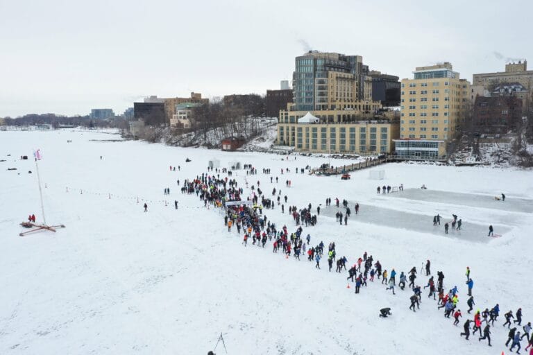 People participating in the 5k walk and run on frozen Lake Mendota